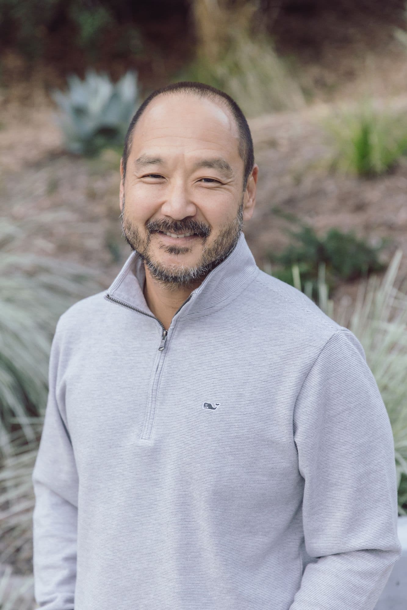 Man in quarter zip sweater outdoor headshot photographer San Francisco