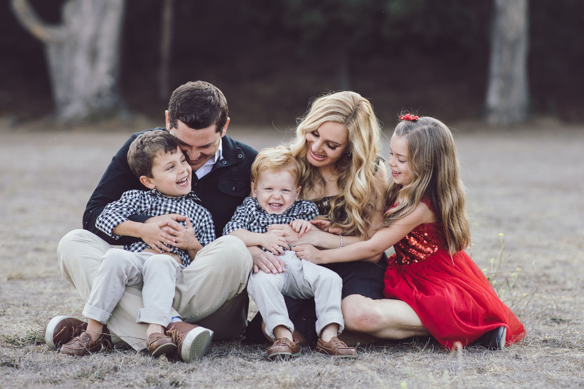 Family portrait session at Cavallo Point in Marin with Golden Gate Bridge View and historic buildings