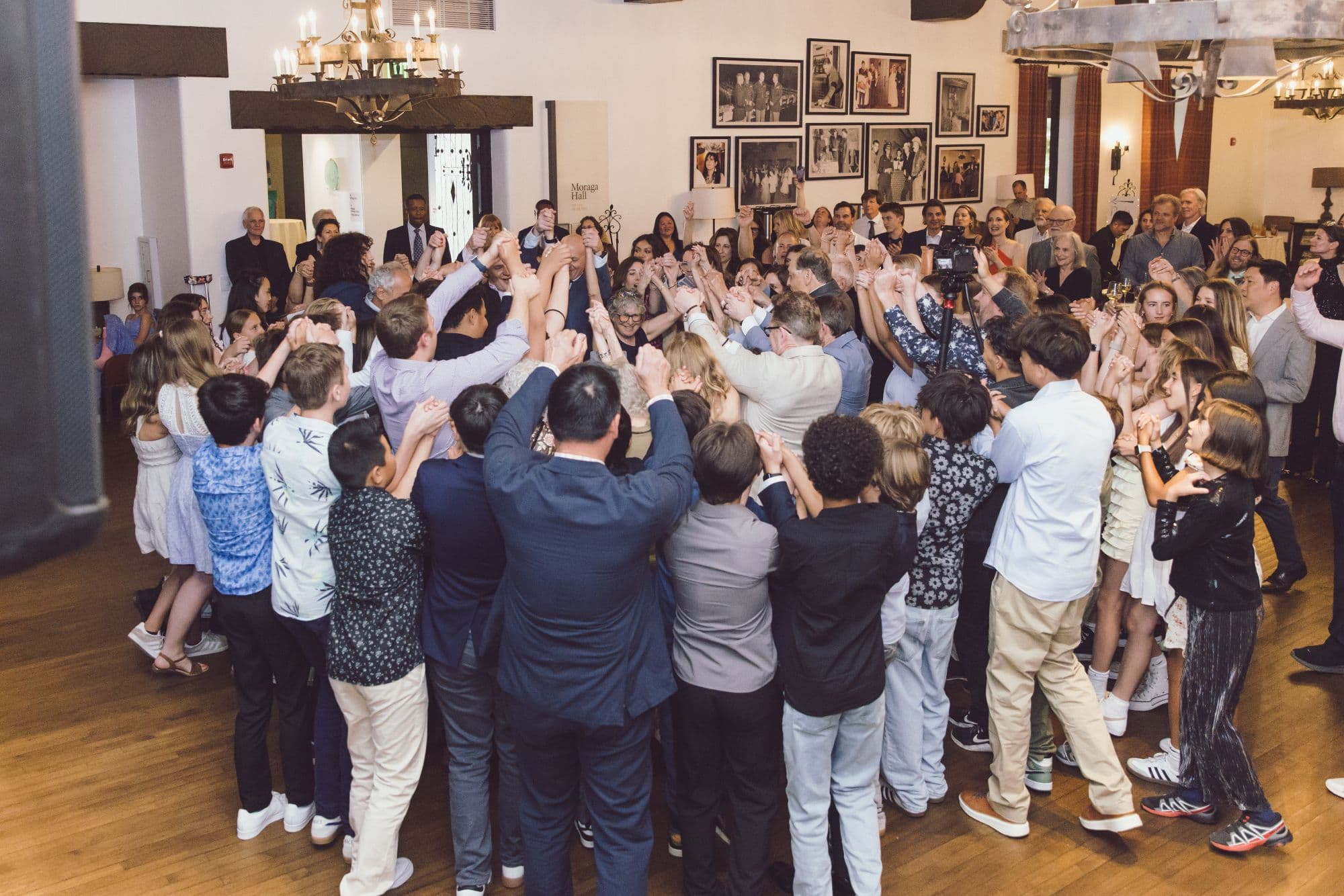 San Francisco Bar Mitzvah photographer captures group dancing celebration at reception